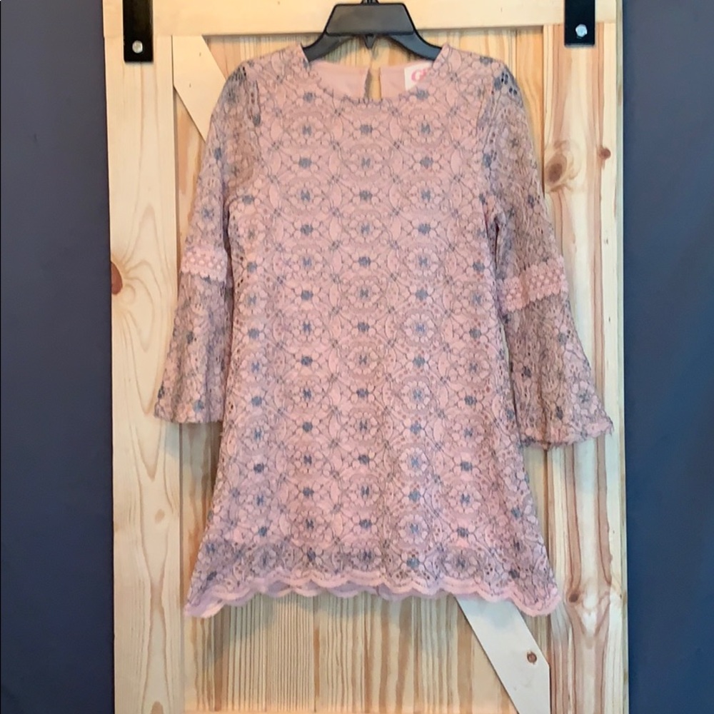 A-line dress with bell sleeves.